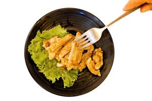 beef steak and Lettuce with fork, focus selective photo