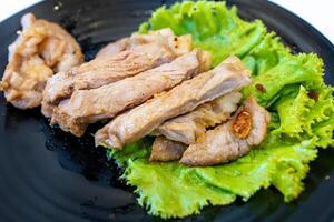 Top view of beef steak and Lettuce with fork, focus selective photo