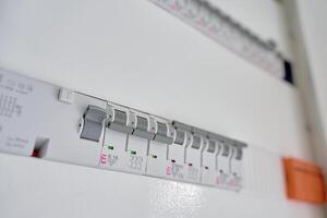 Electrical panel with circuit breakers in fuse box photo