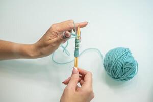 set of loops on the needles step by step. wool and cotton knitting photo