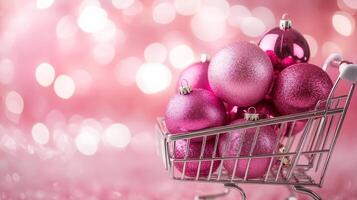 Pink glitter ornaments in a shopping cart against a sparkling background photo