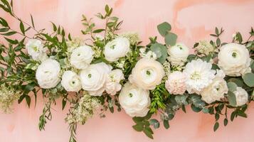 Elegant white floral arrangement against a soft pink background for special occasions and celebrations photo