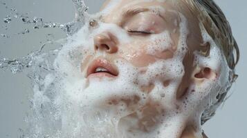 Model experiences refreshing water splash during beauty shoot with bubbles in studio setting photo