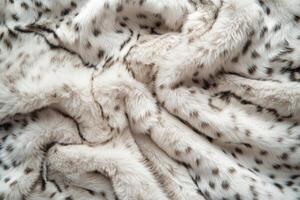 Soft and cozy faux fur fabric with intricate spotted pattern in light colors photo