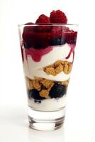 Delicious layered dessert featuring yogurt, berries, and crunchy granola in a clear glass photo