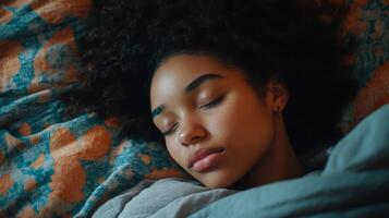 Peaceful woman resting on colorful bedding with eyes closed in a serene indoor environment photo
