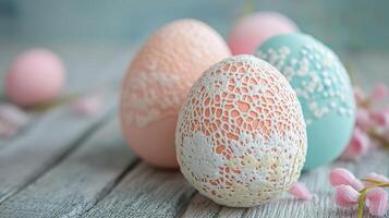 Elegant pastel Easter eggs adorned with lace and fabric accents for a festive spring decoration photo