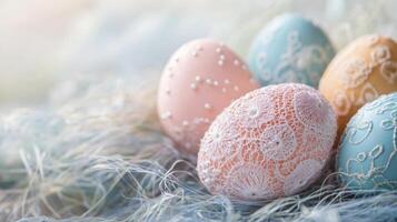 Pastel Easter eggs decorated with lace and fabric textures on a soft, gentle background photo
