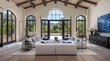 Modern luxury living room with large windows and scenic outdoor view in a serene location photo