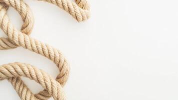 Twisted jute rope creating a loop against a clean white background for craft and decorative use photo