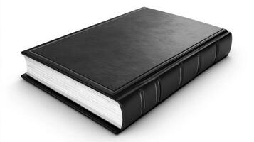 Black hardcover book with textured cover and white pages displayed on a clean background for educational use photo