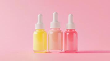 Colorful dropper bottles arranged on a soft pink background creating a vibrant display of skincare products photo