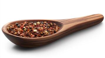Wooden spoon filled with colorful chili flakes ready to spice up dishes in a kitchen setting photo