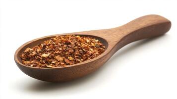 Ground spices in a wooden spoon ready for seasoning dishes and enhancing flavors in culinary creations photo