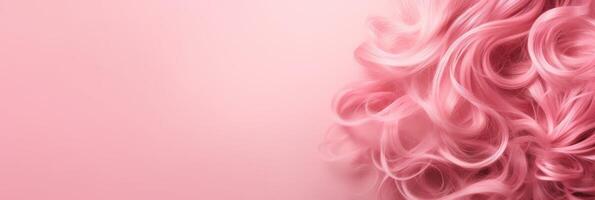 Wavy texture of healthy colored curly pink hair isolated on pink background, baner. photo
