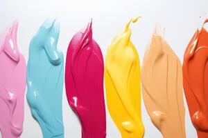 Set of multicolored smears of nail polish isolated on white background. photo