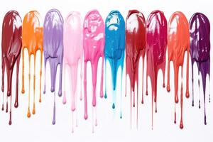 Set of multicolored smears of nail polish isolated on white background. photo