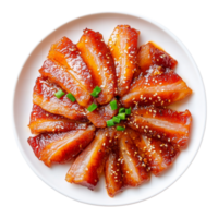 A plate of meat with sesame seeds on top png