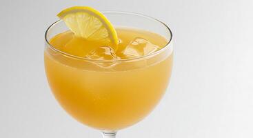 Refreshing Orange Juice in Glass with Lemon Slice and Ice Cubes photo