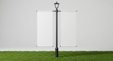 Blank Banner Mockup on Lamp Post in Green Grass Display photo