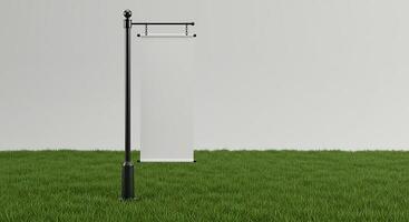 Blank Scroll Mockup Display on a Pole Standing in the Grass photo