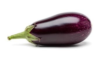 Single Eggplant Lying on White Background Showing Texture and Shape photo