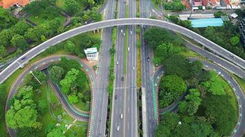 A freeway with a large bridge over it and a city in the background 12 video