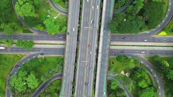 A freeway with a large bridge over it and a city in the background 6 video