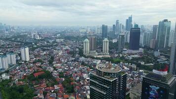 A cityscape with tall buildings and a cloudy sky video