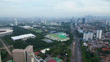 A cityscape with a large highway running through it 4 video