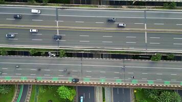A freeway with a large bridge over it and a city in the background 8 video