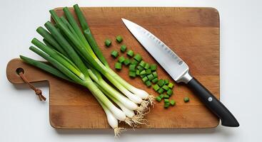 Preparing Fresh Green Onions with Knife on Cutting Board Food Prep photo
