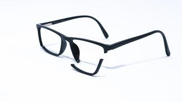 Broken glasses isolated on white background. photo
