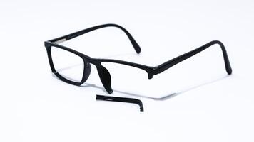 Broken glasses isolated on white background photo