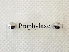 Prophylaxe Sign on Textured Background photo