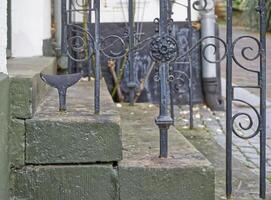 Decorative Iron Gate and Stone Steps photo