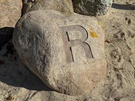 Carved Rock with Letter R photo