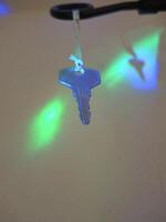 Illuminated Key with Colorful Background photo