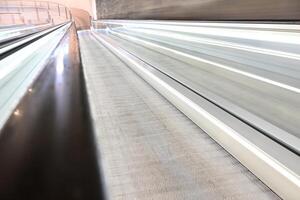Close-Up of a Moving Walkway in Modern Architecture photo