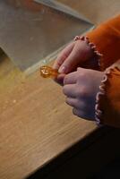 Child's Hands Holding Amber photo