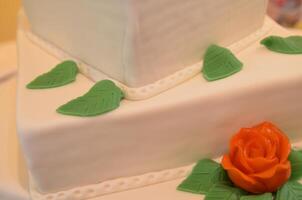 Elegant Fondant Cake with Rose and Leaves photo