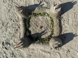 Aerial View of a Sandcastle on the Beach photo