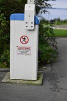 Caution Sign on Barrier Control Box photo