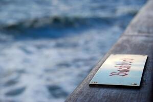 Backbord Sign by the Ocean photo