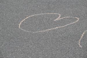 Chalk Heart Drawing on Asphalt photo