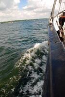 Boat View with Waves and Cloudy Sky photo