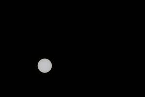 End ofPartial Solar Eclipse in the Sky from Kollund DK in March 2025 photo