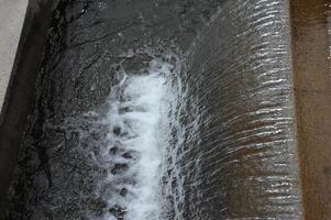 Cascading Water Over Stone Edge photo
