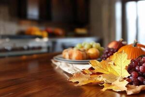 Thanksgiving table with pumpkins, grapes and leaves photo
