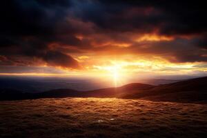 The sun is setting over a grassy hill photo